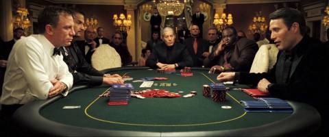 Bond, sweating like a monster, sits opposite Le Chiffre at the poker table in Casino Royale