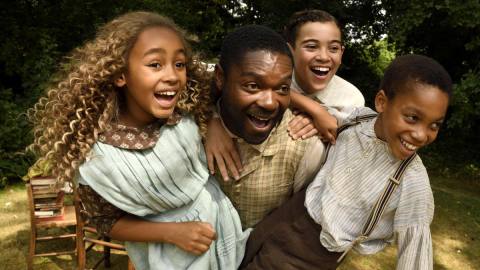 David Oyelowo is surrounded by delighted children in Brenda Chapman’s film Come Away.