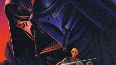 An old version of darth vader looms over luke skywalker on the 1975 cover of Star Wars