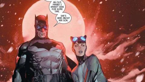 Batman and Catwoman perch on a gargoyle against a red sky and moon. “An old friend I haven’t seen for some time,” he says. “She’s here about her son.” in Batman/Catwoman #1, DC Comics (2020).