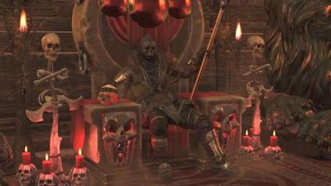 Fallout 76 - a player, dressed as a raider chief, sits on a throne of bones