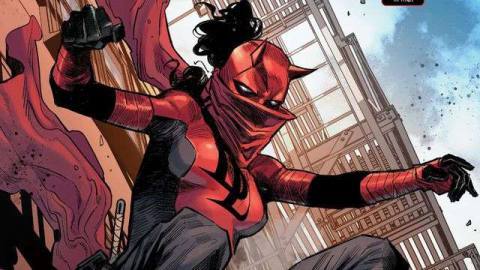 Elektra Natchios leaps from a building in her Daredevil garb, with a flowing scarf, a horned daredevil mask, and her signature billowing hair, in Daredevil #25, Marvel Comics (2020).