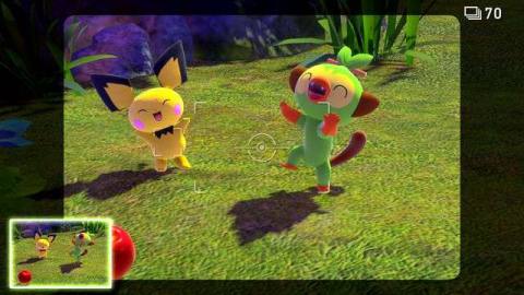 Pichu and Grookey dance in a screenshot from New Pokémon Snap