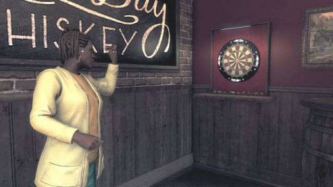 A woman in a yellow blazer readies a darts throw in front of a pub sign advertising whiskey