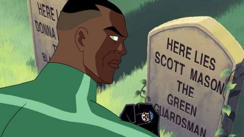 Green Lantern John Stewart stands in front of a grave that says “Here Lies Scott Mason the Green Guardsman” as he looks over his shoulder in Justice League cartoon