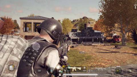 A player in PUBG: New State aims an assault rifle 
