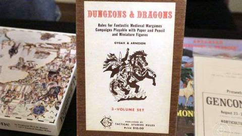 First edition of the original three-volume boxed set of Dungeons &amp; Dragons. Faux woodgrain, with the cover of a knight on horseback applied as a sticker to the top of the box. From the Horticultural Hall in Lake Geneva, Wisconsin in 2017.