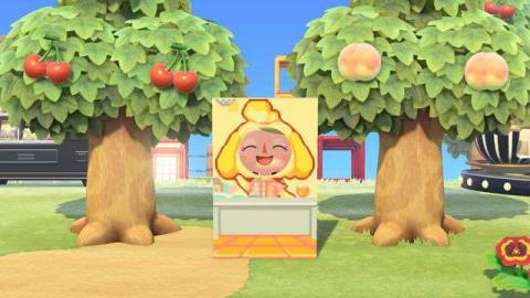 An Animal Crossing character stands in a Isabelle standee cutout.
