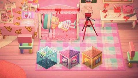Animal Crossing: New Horizons - a villager lies on her bed, next to three Sanrio cute cube animals.