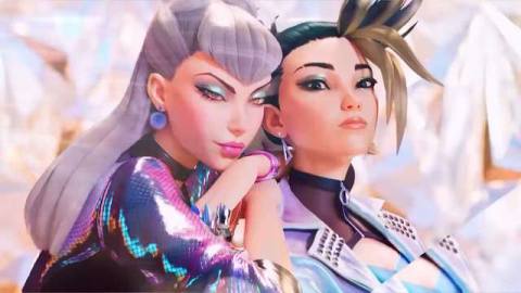 screenshot from teaser trailer for K/DA’s more, with two people staring at the camera wearing flashy clothes