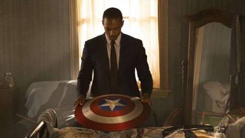 Sam Wilson looks at Captain America’s shield