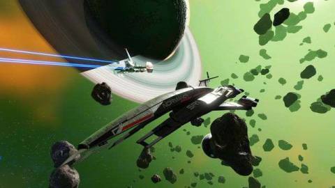 The Normandy from Mass Effect orbits a ringed planet in No Man’s Sky