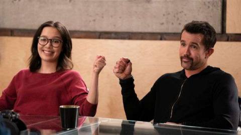 Poppy Li and Ian Grimm fist bump in a conference in Mythic Quest season 2