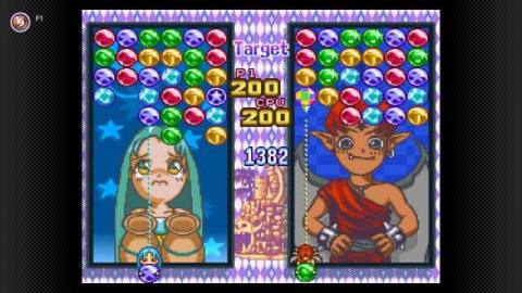 two little fairy characters in the background of a color matching puzzle game