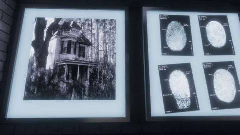 Phasmophobia - a picture of an old house and some fingerprints are framed on the wall of a ghost-hunting lair