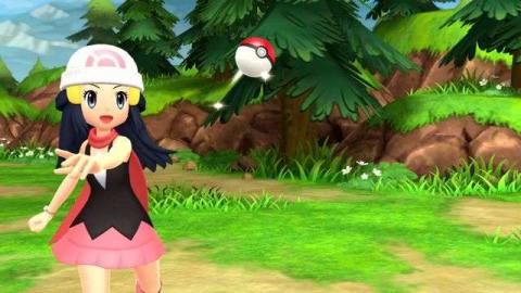 A trainer throws a Pokeball in a screenshot from Pokémon Brilliant Diamond and Pokémon Shining Pearl