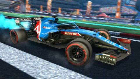 A Rocket League car fitted in the Alpine F1 racing livery, driving on Pirelli soft tyres