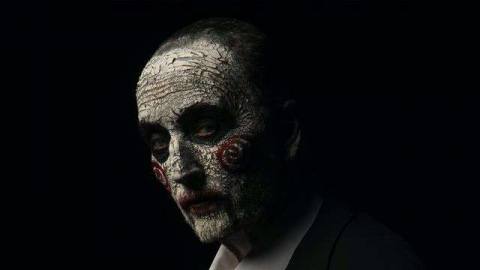 Tobin Bell as Jigsaw in facepaint in a promo image for 2017’s Jigsaw
