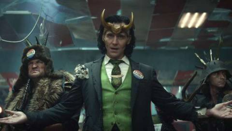President Loki spreads his arms in front of his squad of Variant Lokis in Loki. 