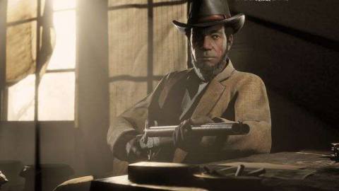 A cowboy holds a shotgun in Red Dead Online