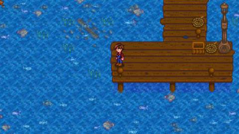 A pixelated farmer fishes off a dock. there are tiny fish sprites in the water