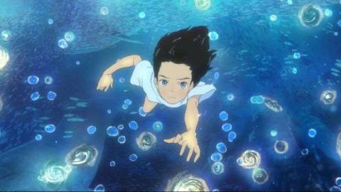a girl swims in the sea