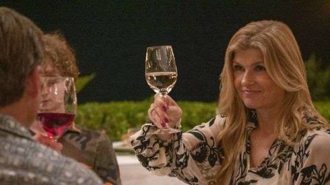 Connie Britton offers a toast in HBO Max’s The White Lotus