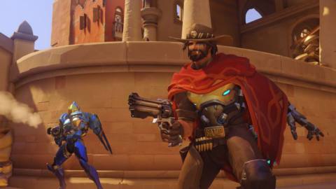 McCree aims his six-shooter with Pharah in the background in a screenshot from Overwatch