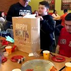 Little bro had been saving up for a PS4, so big bro surprises him with one on his birthday