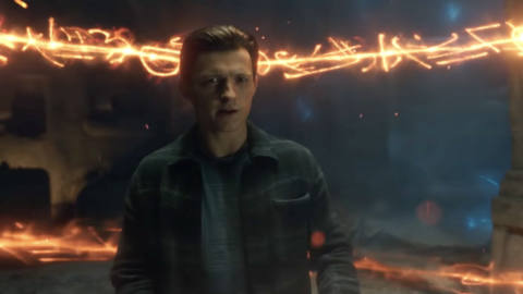 Peter Parker stands in the middle of swirling magic energy looking worried in Spider-Man: No Way Home.