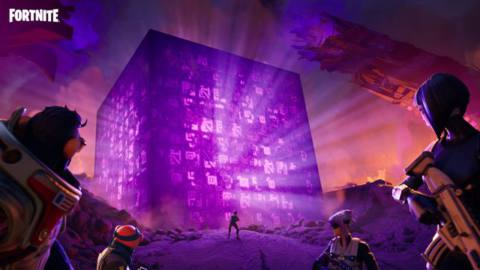 Fortnite players standing in front of the Cube