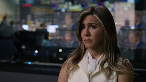 Alex Levy (Jennifer Aniston) stands at the ready in a control room in the Apple TV Plus drama The Morning Show.