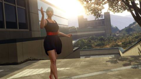 Grand Theft Auto Online - a blue haired woman in a dark blue dress walks and waves. She looks professional, and she is entering a large stage venue as the sun is in the sky behind her.