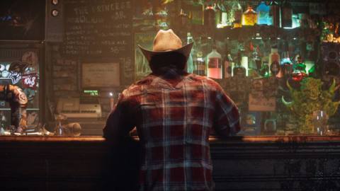 Wolverine sits at The Princess Bar in Insomniac Games’ upcoming video game about him