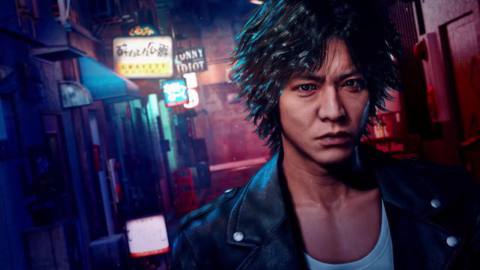 Lost Judgment’s protagonist, Takayuki Yagami, stands in a dark alleyway