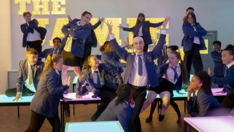 Jamie sings and dances with his class in Everybody’s Talking About Jamie