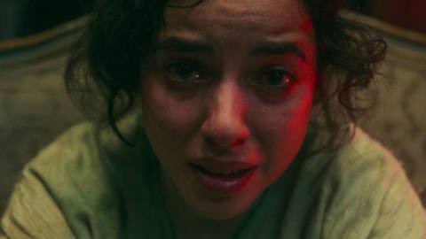 Cristina Rodlo as Ambar, in closeup, weeping and frightened