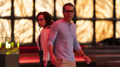 Jodie Comer as Molotov Girl and Ryan Reynolds as Guy in 20th Century Studios’ FREE GUY.