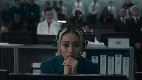 Mitsuki Yamato, a control room employee in the Japanese space program, sits nervously at her station in the Apple TV Plus show Invasion.