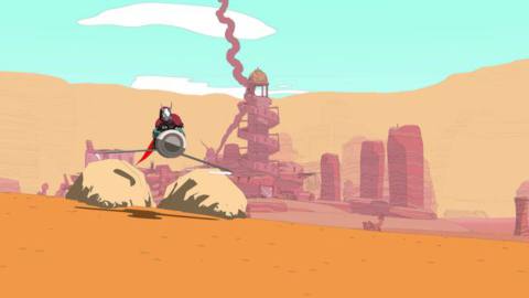 sable, the cloaked and masked character from sable, rides her hover bike in a desert 