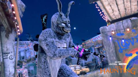 Frank the Rabbit runs with a colorful gun in a screenshot from Call of Duty’s The Haunting event