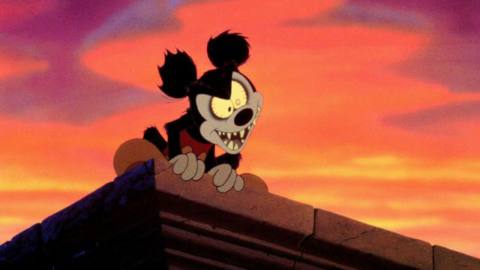 Rabid Mickey growls from atop a building in Runaway Brain