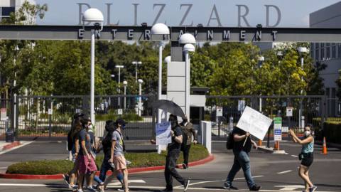 Activision Blizzard employees stage a walkout in the response from company leadership to a lawsuit highlighting alleged harassment, inequality