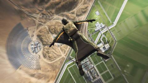 A player dives in a wingsuit over Egypt, in Battlefield 2042’s Renewal map