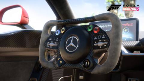the futuristic interior of the Mercedes-AMG One, with a rectangular steering wheel and a tablet-shaped dashboard, in Forza Horizon 5