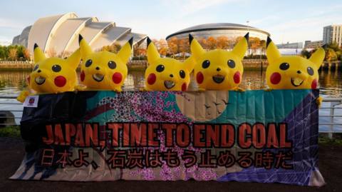 Pikachus protest Japan’s coal consumption at COP26