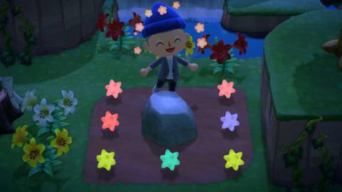 An Animal Crossing: New Horizons character standing behind a rock with star fragments, clearly delighted