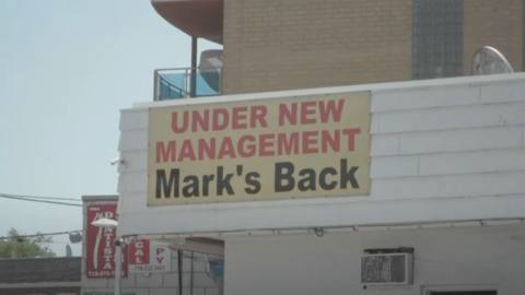 A sign in New York City announces “Mark’s Back”