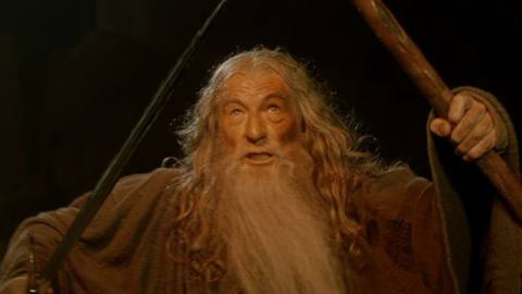 Gandalf brandishes his sword and staff at the Balrog in The Fellowship of the Ring.