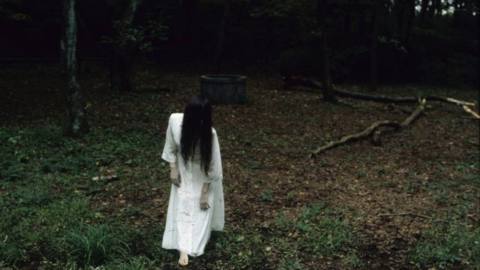 Sadako&nbsp;Yamamura walks out of a well in a still from the original Ringu (Ring)